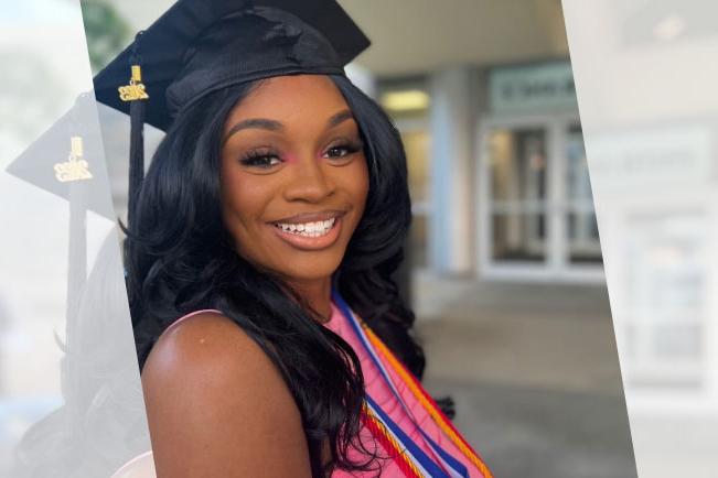 Saeda smiling with graduation cap on